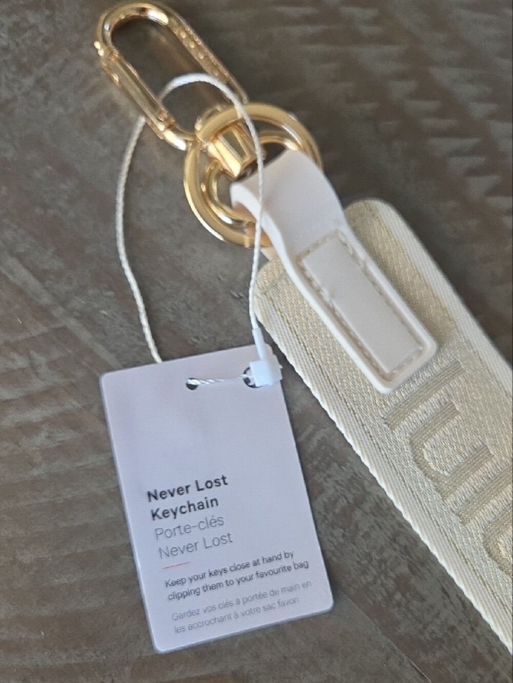 lululemon athletica Metallic Gold Never Lost Keychain Wristlet - Picture 4 of 5